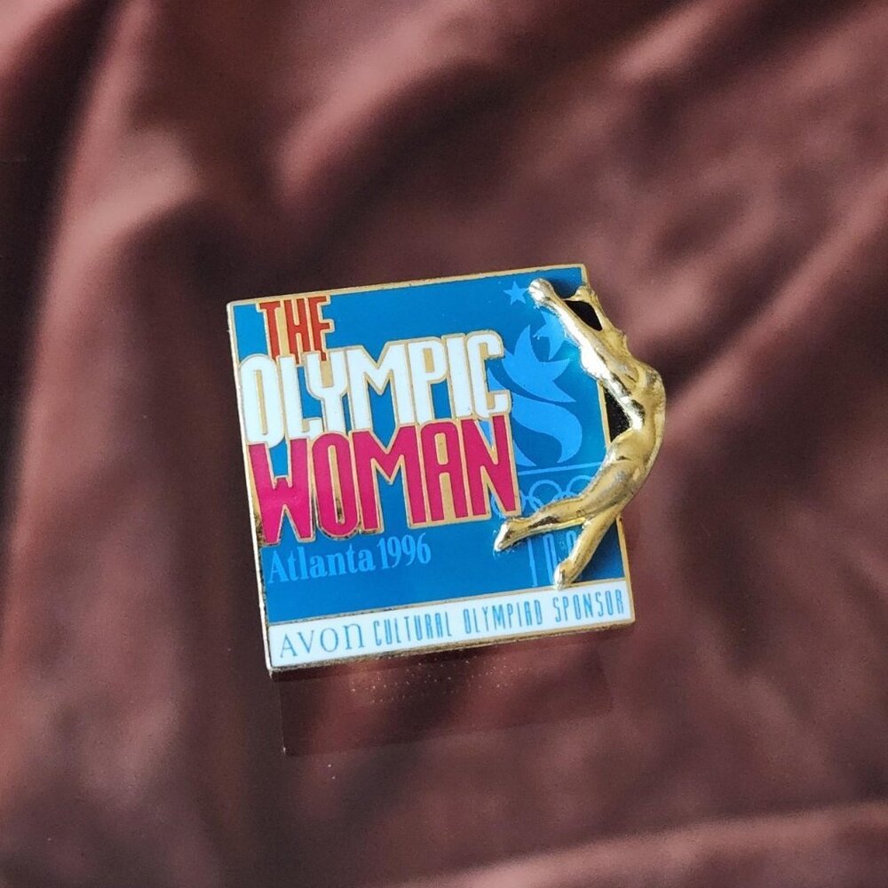 1992/ AVON Atlanta 1996 "The Olympic Woman" Red/White/Blue gold-tone pin.